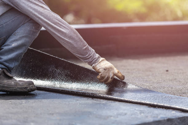 Professional Waterproofing technician working in Pierson, MI